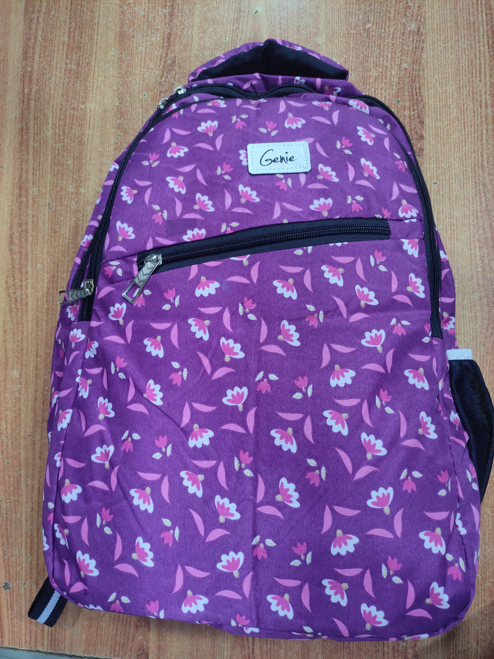 Genie Floral Print Lightweight School Backpack for Girls | Casual Travel Daypack with Front Zip Pocket for Bags online India